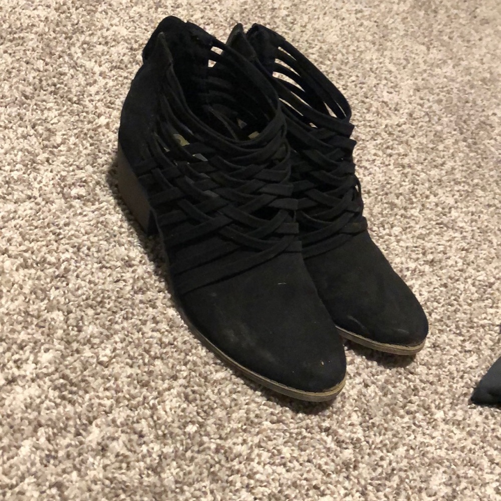 Black suede booties with strapy detail